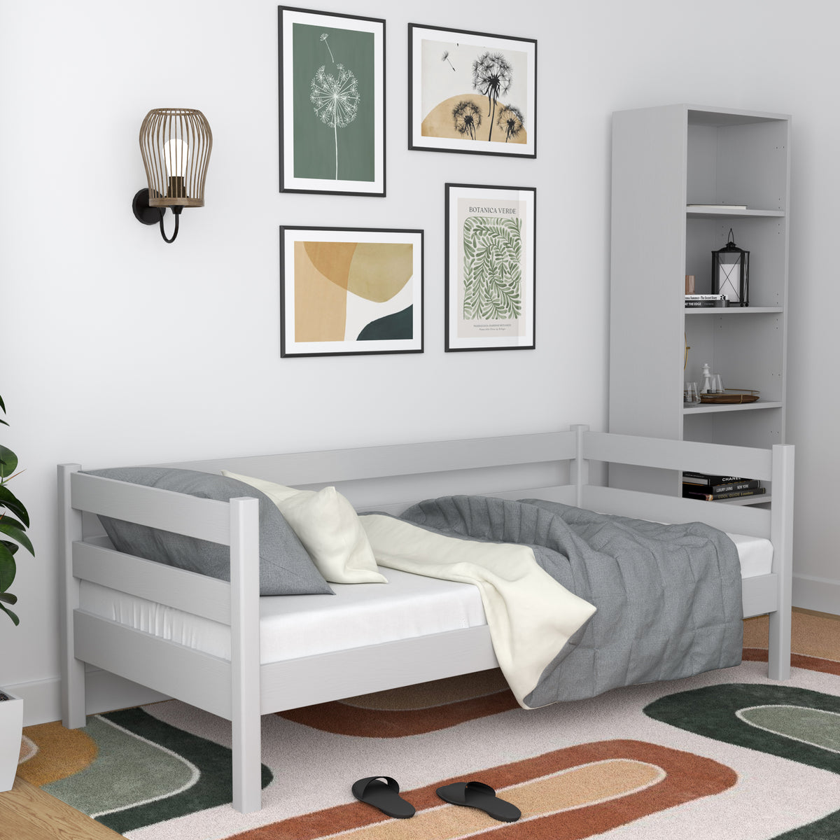 Grey sofa bed in a child’s room – scandi arrangement, wooden