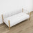 Sofa bed white with oak – wooden legs and base, close-up of details